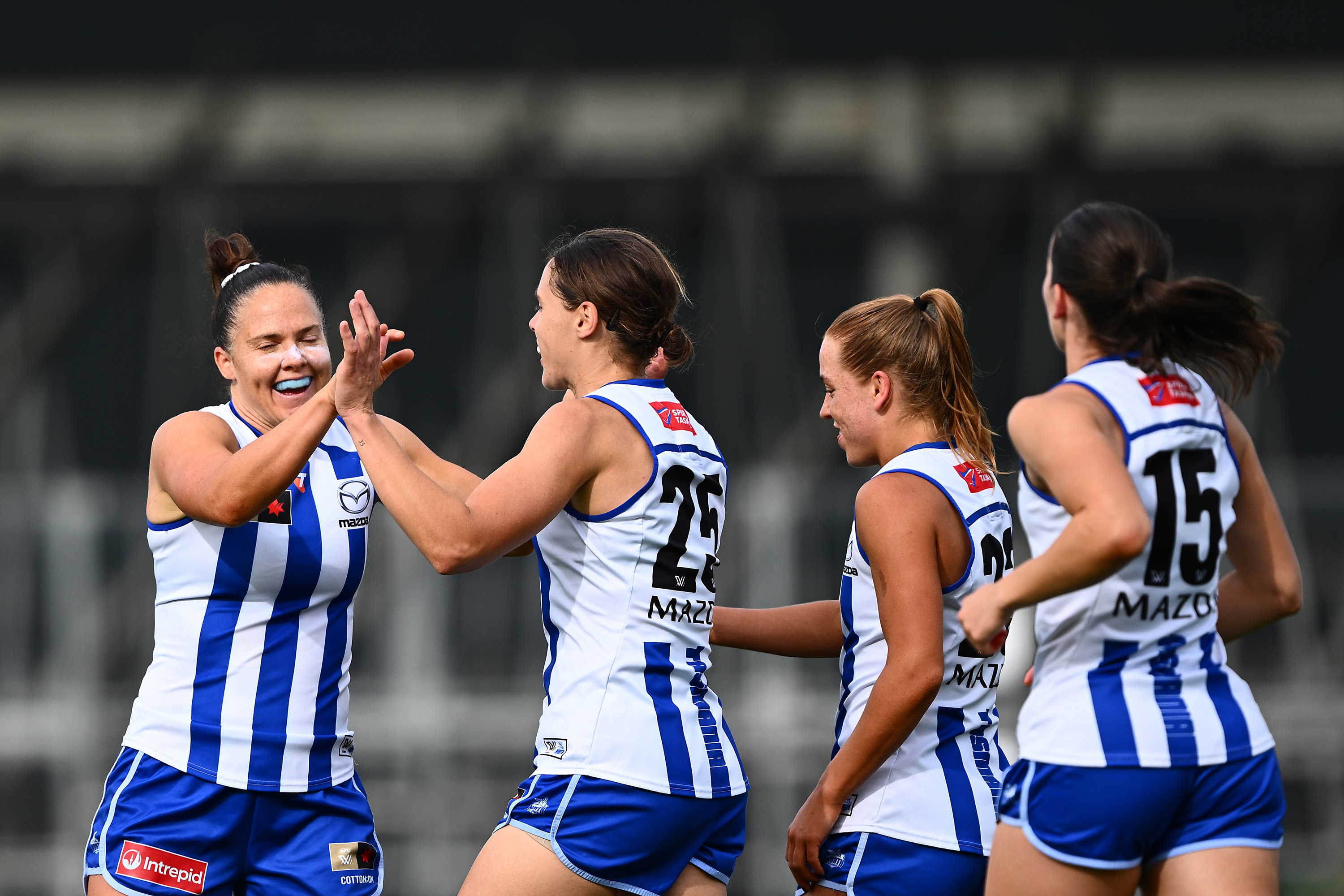 20 up: Roos' rampage kicks up another gear with Swans clinic