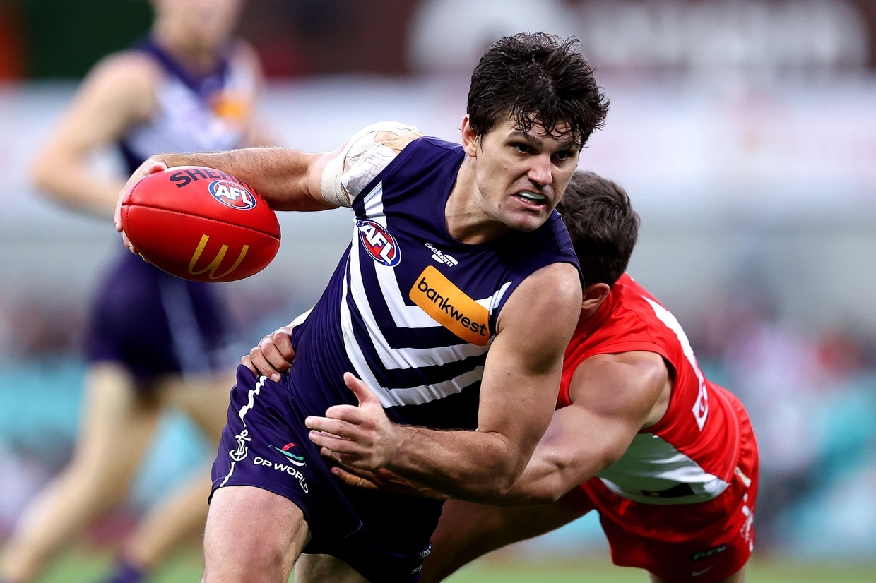 SYDNEY, AUSTRALIA - Lachie Schultz of the Dockers competes with Oliver Florent of the Swans during the ninth round of AFL match between Sydney Swans and Fremantle Dockers at Sydney Cricket Ground on 13 May 2023 in Sydney, Australia. (Photo by Brendon Thorne / AFL Photos / www.afl.com.au)