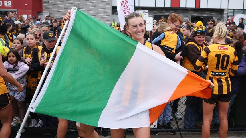 Aine McDonagh poses with an Irish flag after the round four AFLW match between Hawthorn and St Kilda at RSEA Park, on September 21, 2024. Picture: AFL Photos