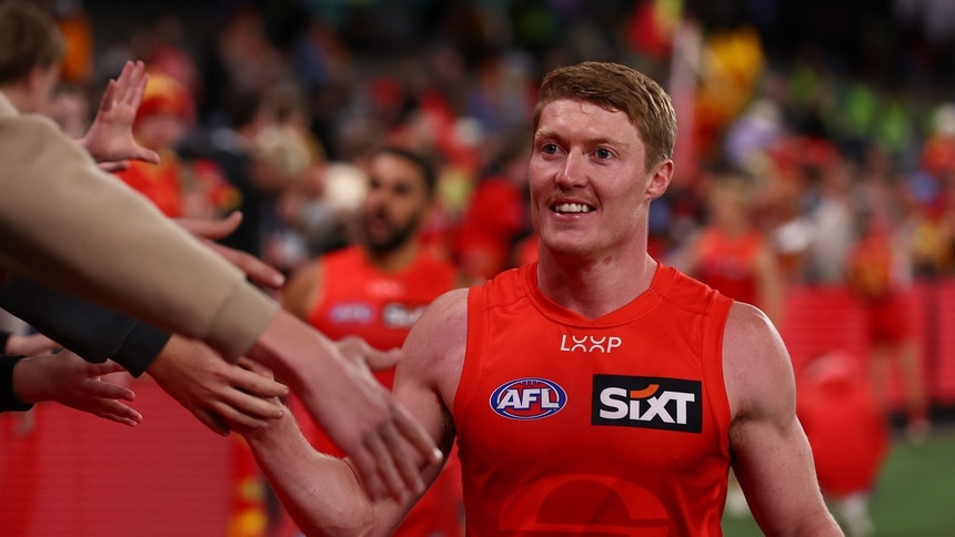 Matt Rowell celebrates with fans following the match between Essendon and Gold Coast at Marvel Stadium in round 17, 2025. Picture: AFL Photos