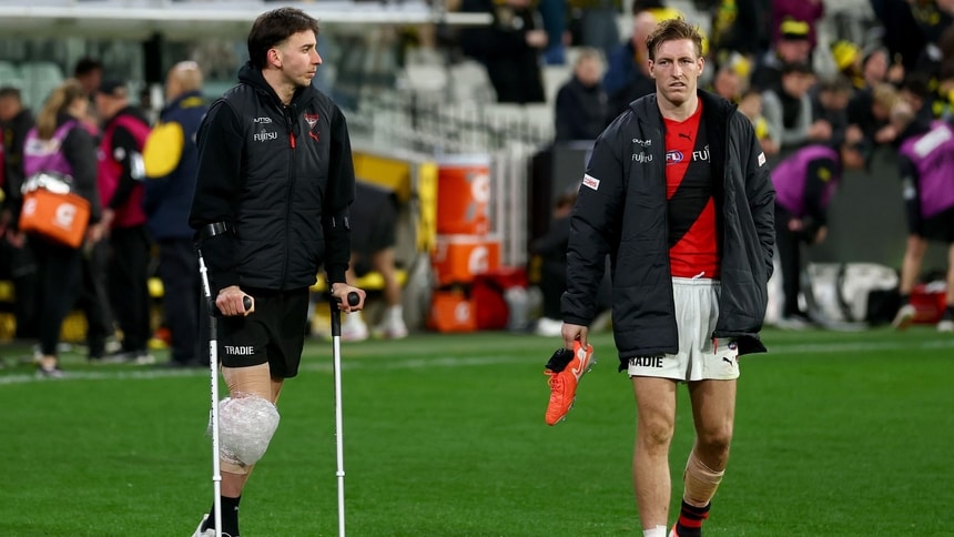Nic Martin (left) and Will Setterfield look on after the round 18 match between Essendon and Richmond at the MCG on July 12, 2025. Picture: AFL Photos