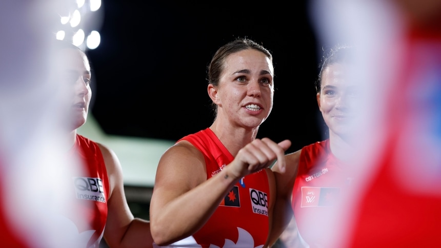 Chloe Molloy speaks to her teammates during round one, 2025. Picture: AFL Photos/Getty Images