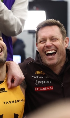 Jarman Impey, Sam Mitchell and Jai Newcombe sing the song after Hawthorn's win over Adelaide in the semi-final at Adelaide Oval on September 12, 2025. Picture: AFL Photos