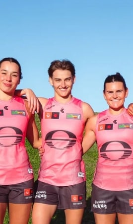 Darcie Davies, Lucy Single, Taya Oliver, Lily Mithen and Havana Harris show off Gold Coast's pink guernsey. Picture: Gold Coast FC