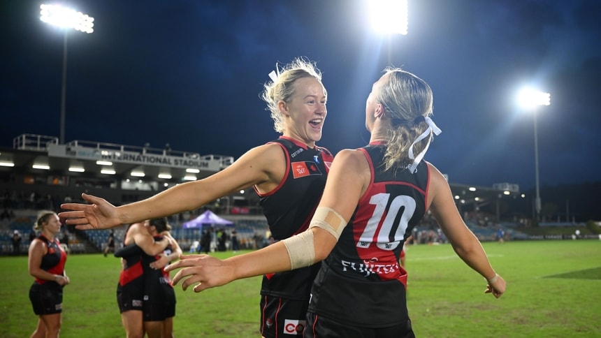 Sophie Strong (left) and Holly Ridewood celebrate a win during round 12, 2025. Picture: AFL Photos/Getty Images