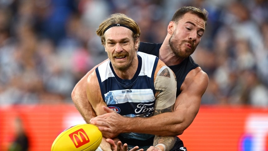 Tom Stewart is tackled by Harry McKay during the game between Geelong and Carlton in R7, 2025. Picture: AFL Photos
