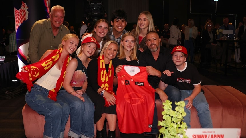 Sunny Lappin (Gold Coast Academy) poses with family after being drafted with pick No.4 by Gold Coast in the 2025 AFLW Draft. Picture: Getty Images