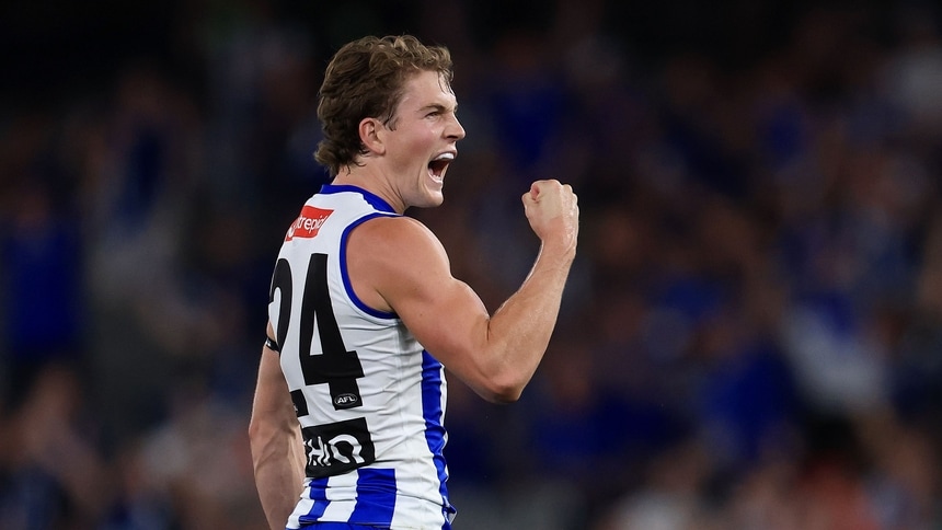 Tom Powell of the Kangaroos celebrates a goal during the Round 1 AFL match between North Melbourne and Port Adelaide at Marvel Stadium. Picture: Morgan Hancock/AFL Photos