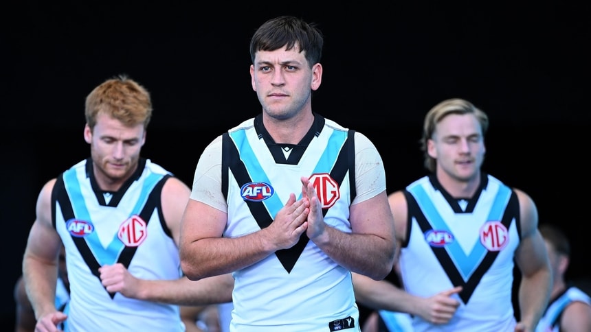Zak Butters leads Port Adelaide out ahead of its clash with Richmond in round four, 2026. Picture: AFL Photos