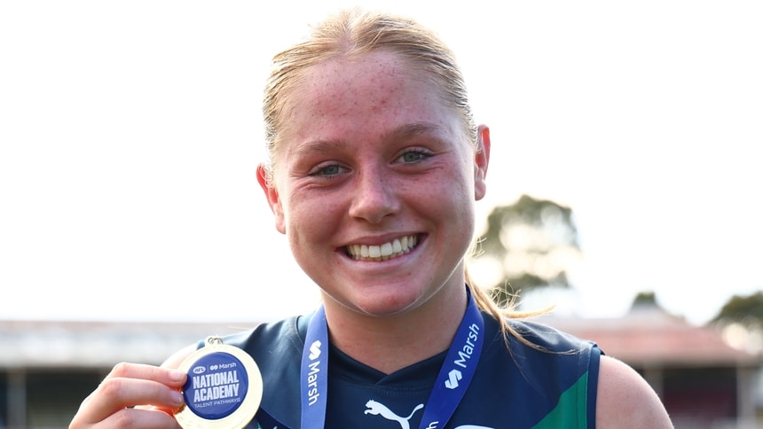Scout Semple poses with the medal for best on ground following the Marsh AFL National Academy Girls match against Carlton VFLW at Ikon Park on April 26, 2026. Picture: AFL Photos