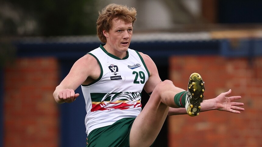 Hugh Dixon of the Devils kicks the ball during the Smithy's VFL Round 10 match between Port Melbourne and Tasmania at ETU Stadium. Picture: Morgan Hancock/AFL Photos