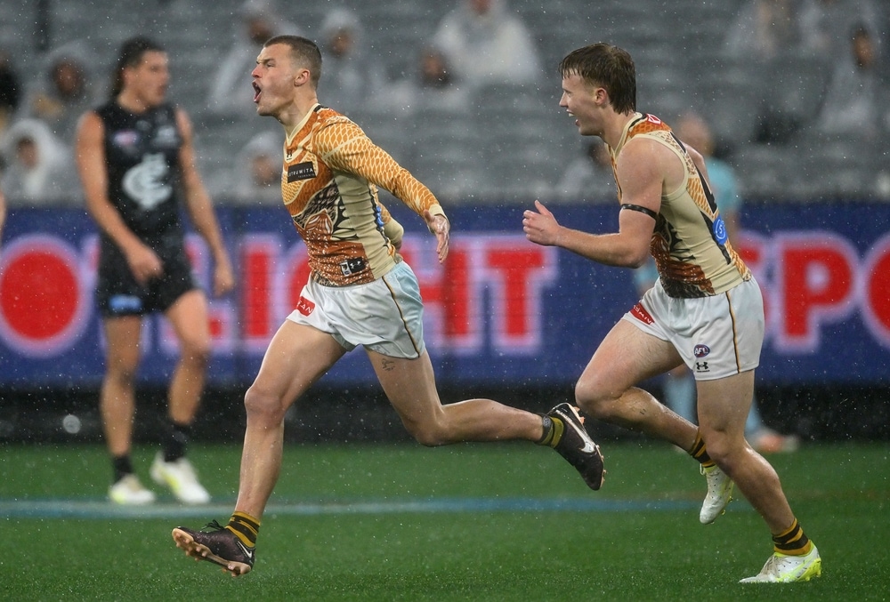 Hawks snap Blues' streak in wet and wild clash