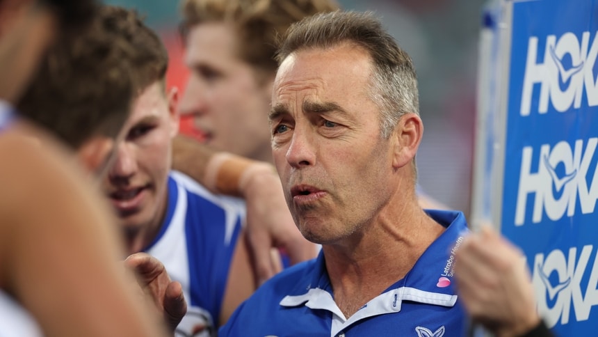 Alastair Clarkson speaks to his players during North Melbourne's clash against Sydney in round 24, 2026. Picture: Getty Images