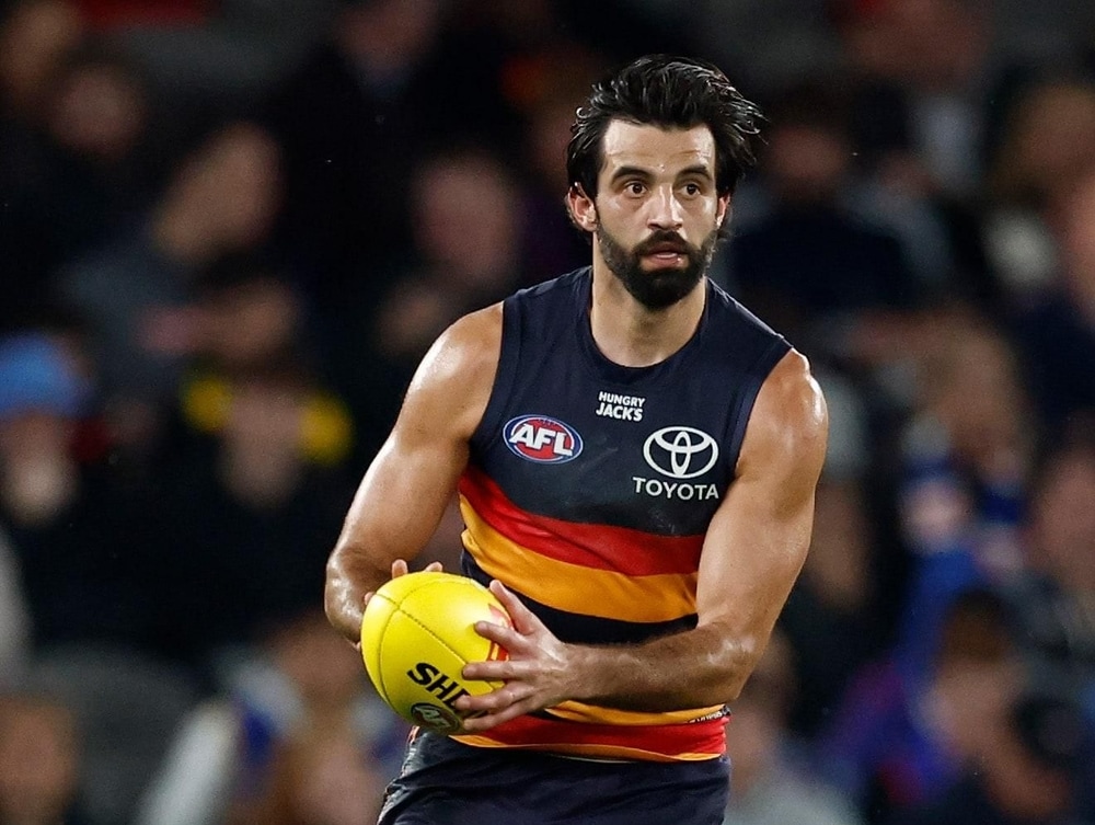 Defender says 'fire in the belly' powering Crows' redemption bid