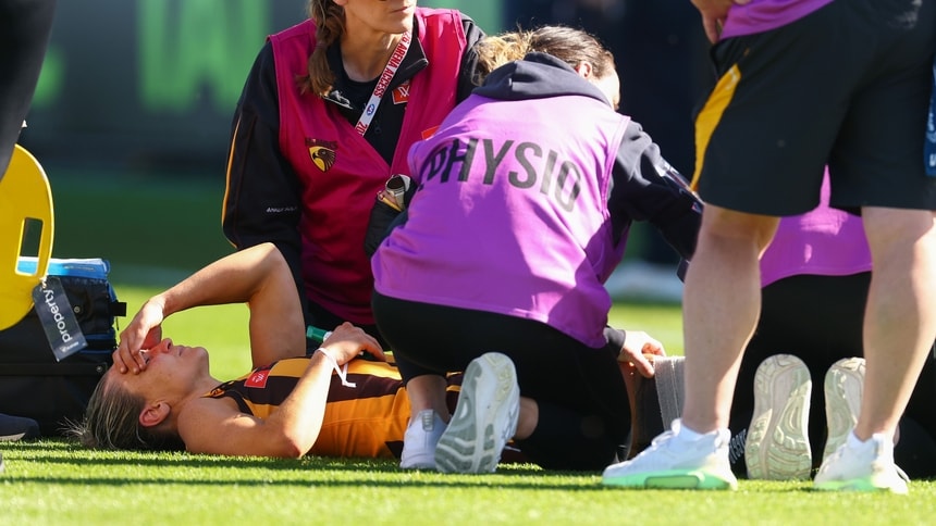 Emily Bates is treated by medical staff after injuring her knee during the match between Hawthorn and the Western Bulldogs in R5, 2026. Picture: AFL Photos