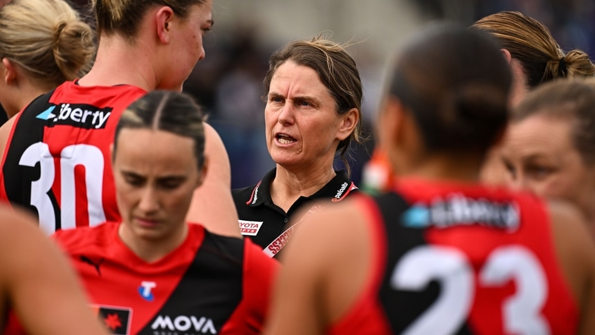 Natalie Wood speaks to her Essendon players during round five, 2026. Picture: AFL Photos