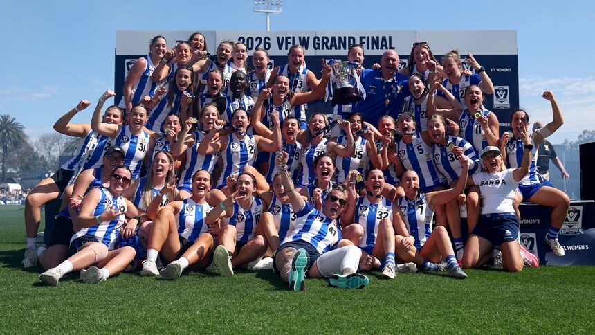 North Melbourne Werribee players celebrate after winning the 2026 VFLW Grand Final against Williamstown at IKON Park. Picture: Josh Chadwick/AFL Photos