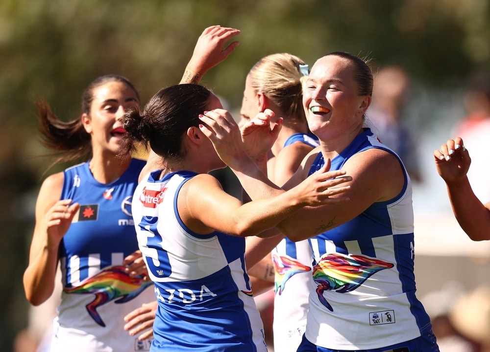 Roos ramp it up to shake off plucky Bombers, keep top spot