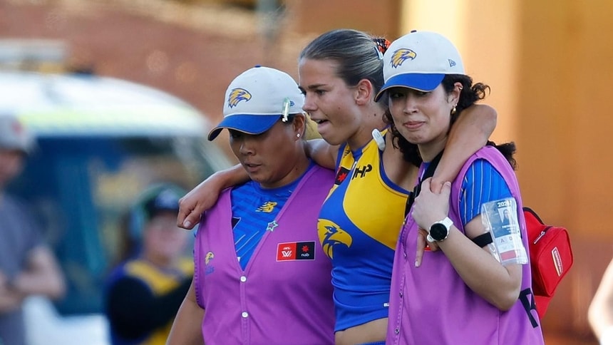 Ella Roberts leaves the field in the hands of trainers during round 12, 2026. Picture: AFL Photos